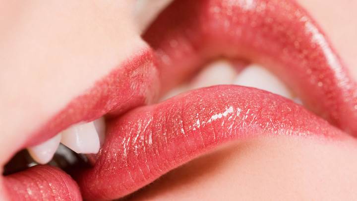 Kissing Glossy Red Lips Closeup